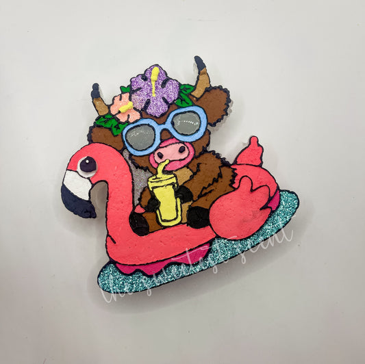 HIGHLAND COW ON FLOAT