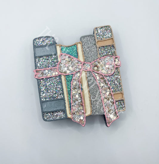 BOOK STACK WITH BOW